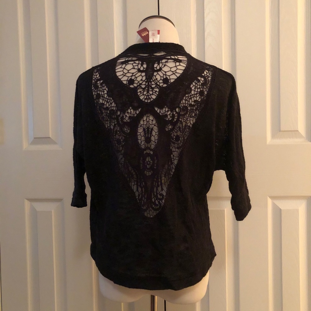 Black shrug